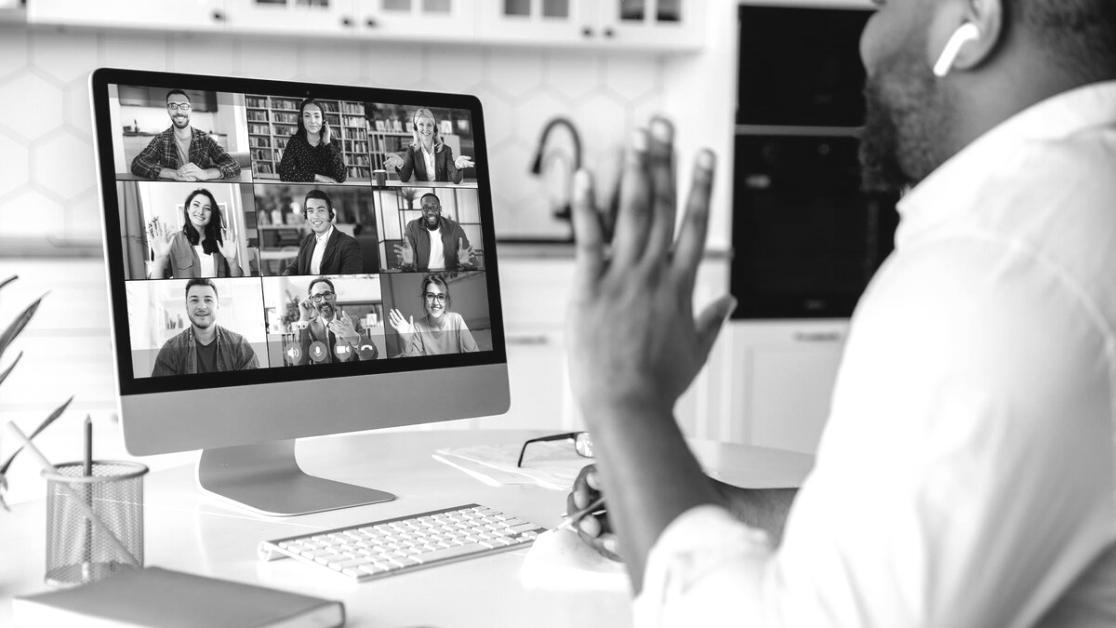 Student working on business strategy project with framework diagrams and analysis